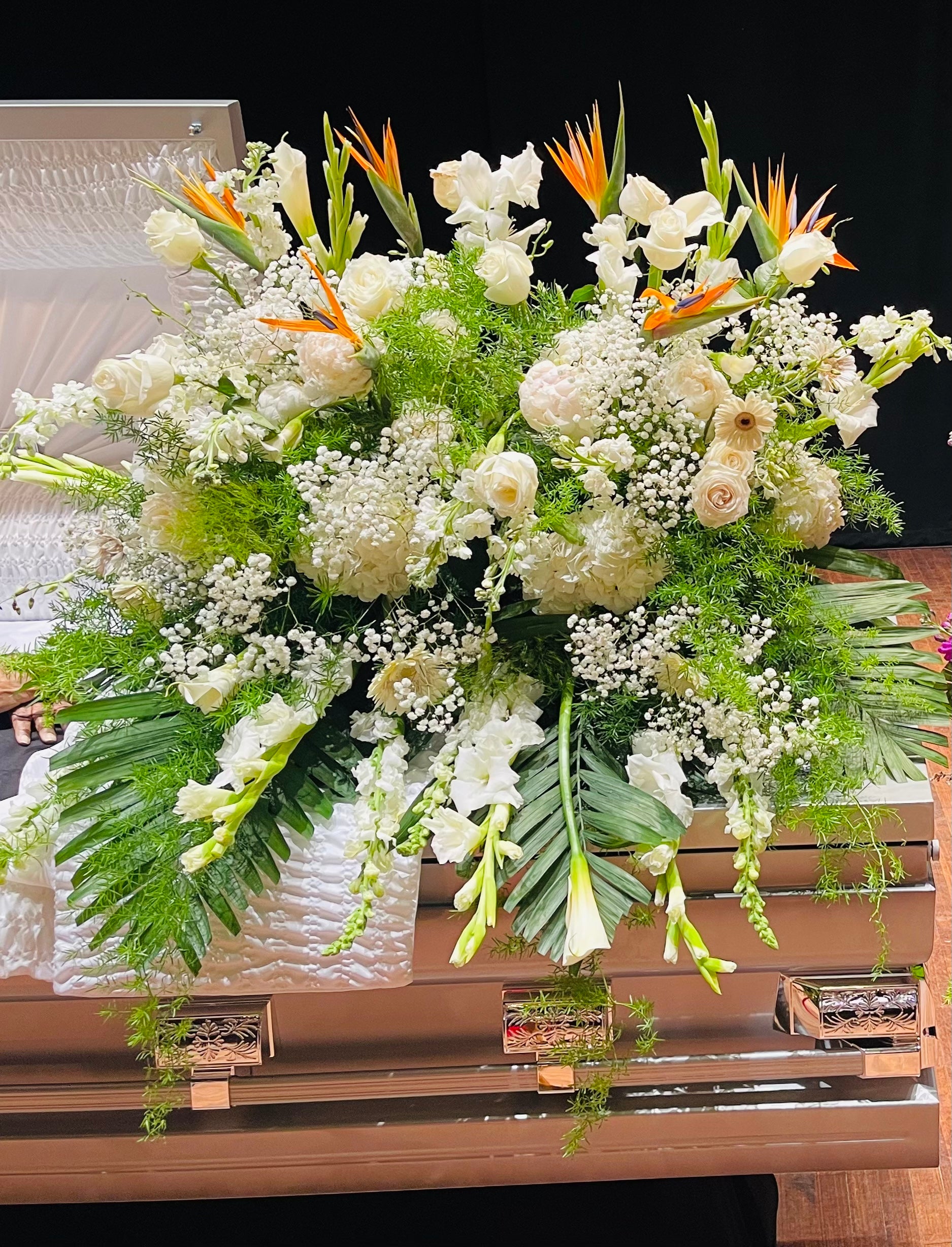 white lilies in paradise Doves Paradise Casket Spray